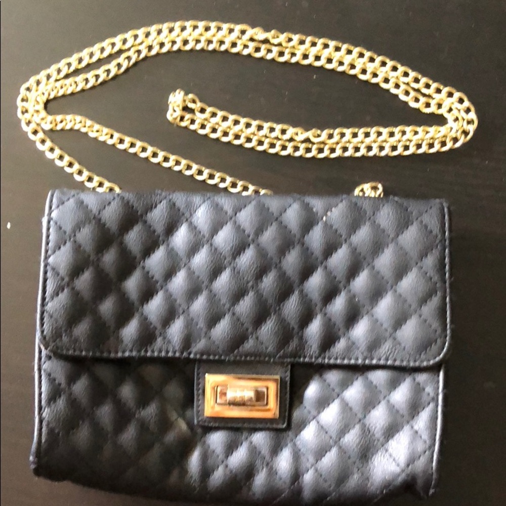 Quilted Black and gold Lulu purse.